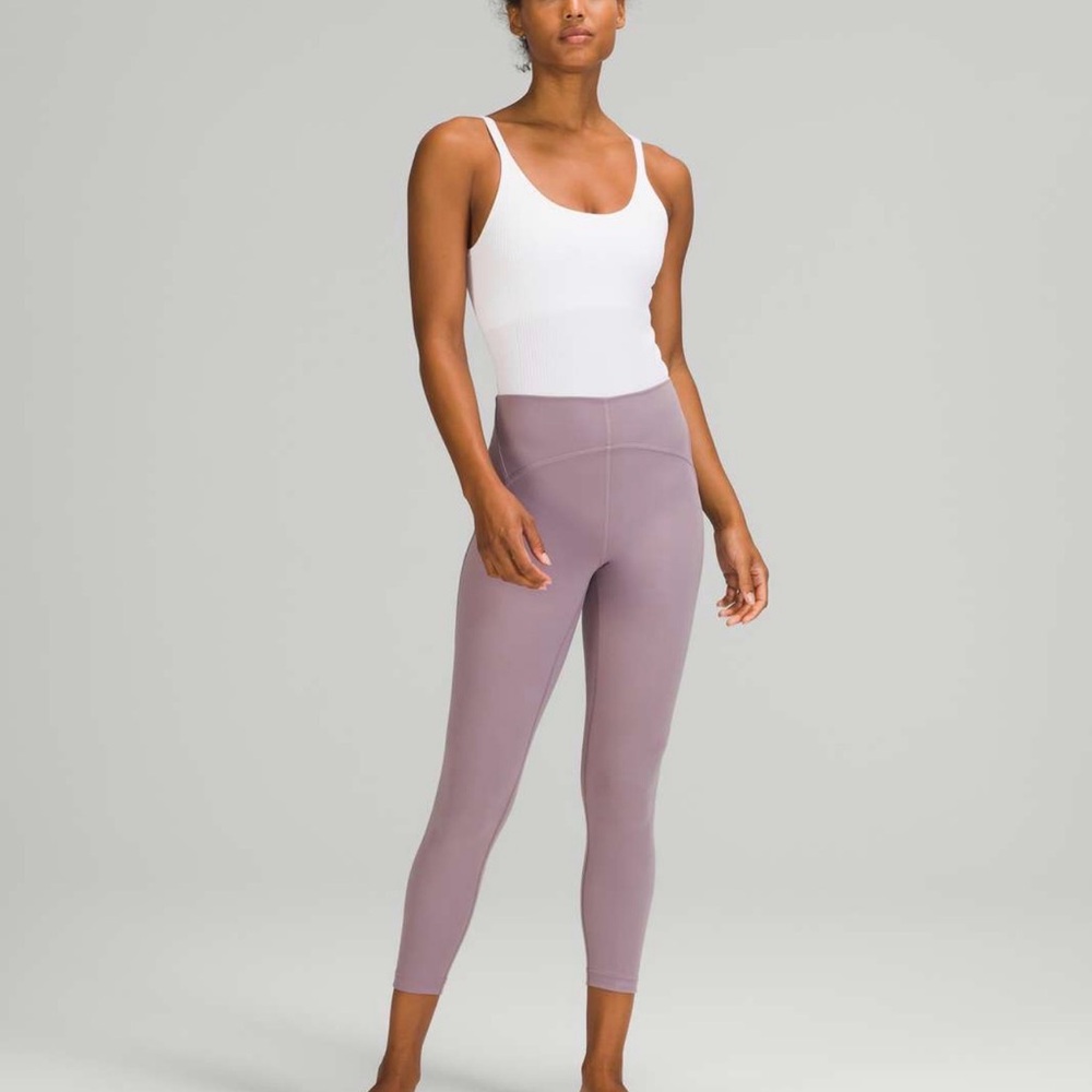 Lululemon Ebb to Street Bodysuits x2 in ribbed material. Set of 2 white & black
